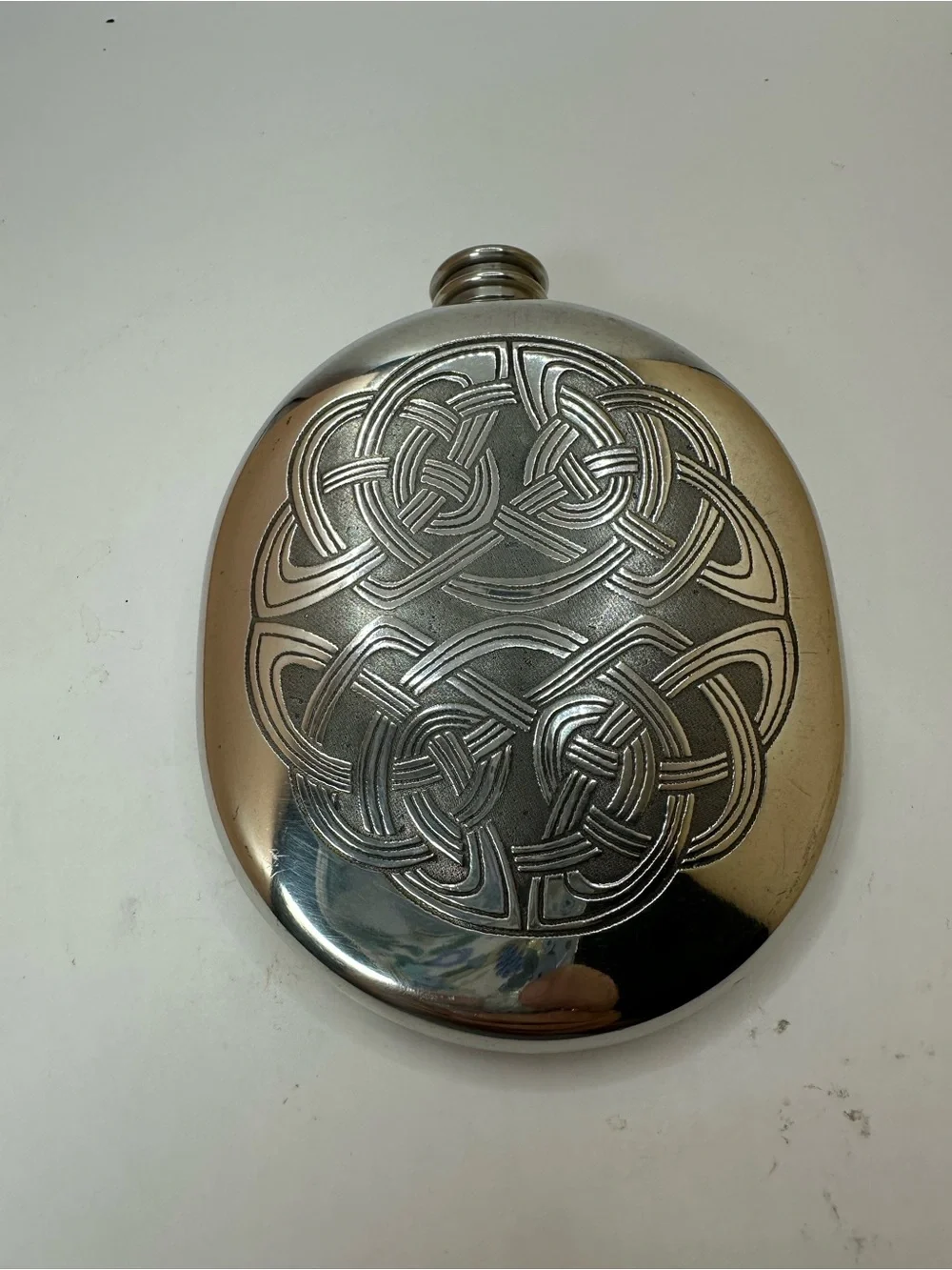 Scottish Piper Pewter Flask with Celtic Knot Design.